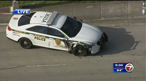 Car crashes into police cruiser in NW Miami-Dade